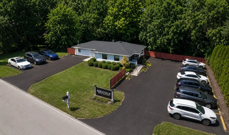 Aerial view of the Noblesville Dental Associates office and parking lot at 17567 River Road
