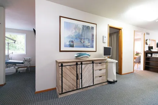 The hallway at the Noblesville office with a treatment room by the window